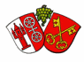 Das Kiedricher Wappen links in weiß und der roten Burgruine Scharfenstein und rechts, auf rotem Untergrund, das weiße mit einem Kreuz verbundene Doppelrad. Rechts davon ist das rote Wappen von Hautvillers, auf dem sich zwei alte goldene Schlüssel kreuzen.. Oben ist zwischen den beiden Wappen eine grüne Weintraube mit grünen Blättenr und einem braunem Stiel.
